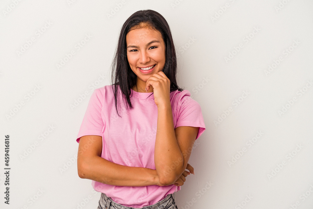 Young latin woman isolated on white background smiling happy and confident, touching chin with hand. Young latin woman isolated on white background smiling happy and confident, touching chin with hand.