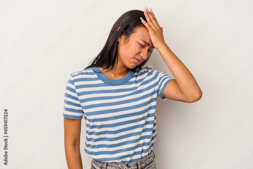 Young latin woman isolated on white background forgetting something, slapping forehead with palm and closing eyes. Young latin woman isolated on white background forgetting something, slapping forehead with palm and closing eyes.