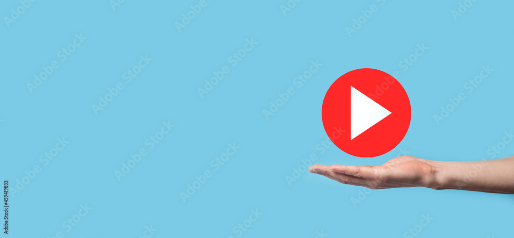 Businessman pressing, hold play button sign to start or initiate projects.Video Play Presentation. Idea for business, technology.media player button. Play icon.Go. Businessman pressing, hold play button sign to start or initiate projects.Video Play Presentation. Idea for business, technology.media player button. Play icon.Go.