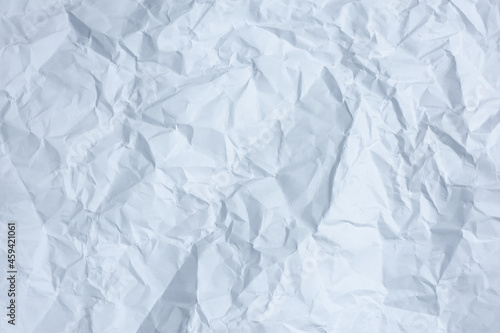 Crumpled sheet of white paper, background texture