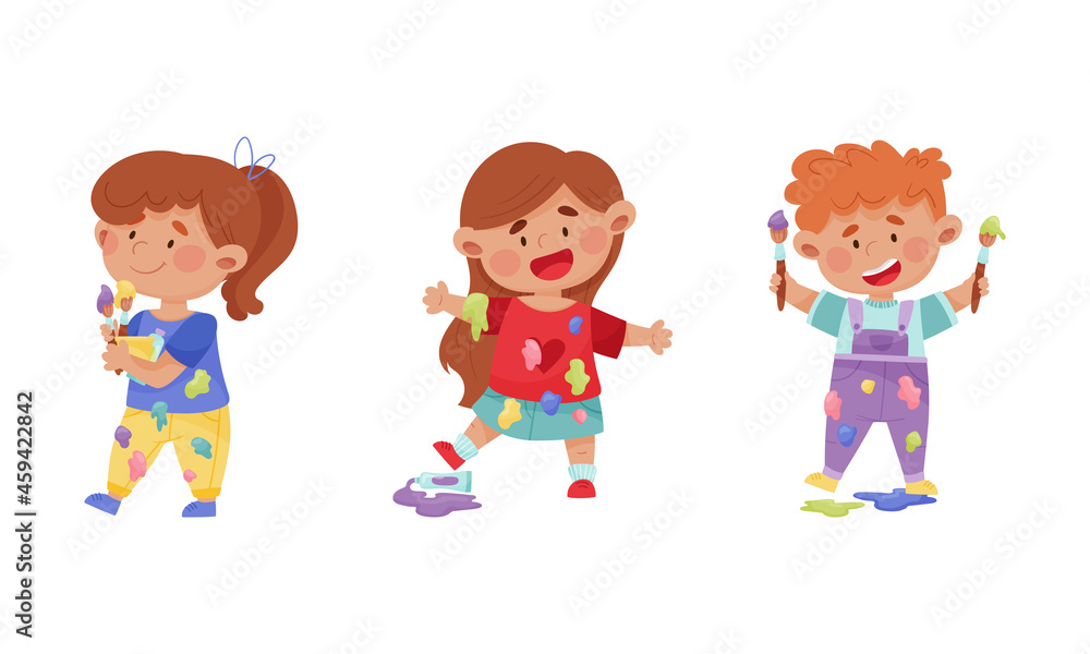 Creative kids in stained clothes holding paint brushes set cartoon vector illustration