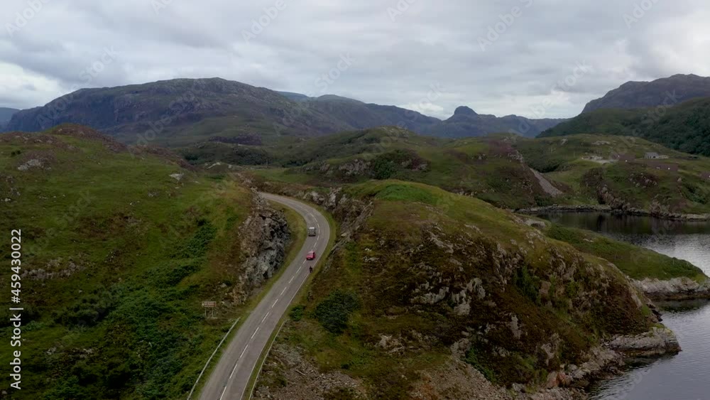 Drone shot of the Kylesku Bridge in north-west Scotland that crosses the Loch a' Chàirn Bhàin in Sutherland Drone shot of the Kylesku Bridge in north-west Scotland that crosses the Loch a' Chàirn Bhàin in Sutherland