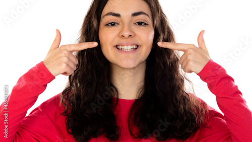 Fototapeta Naklejka Na Ścianę i Meble -  Young brunette woman smiling cheerful showing and pointing with fingers teeth and mouth.Dental health concept.