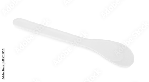 Plastic spatula for depilatory wax isolated on white photo