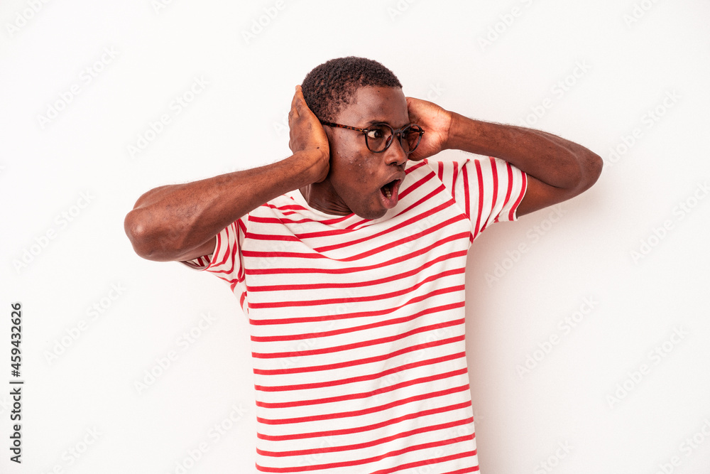 Young African American man isolated on white background screaming, very excited, passionate, satisfied with something. Young African American man isolated on white background screaming, very excited, passionate, satisfied with something.