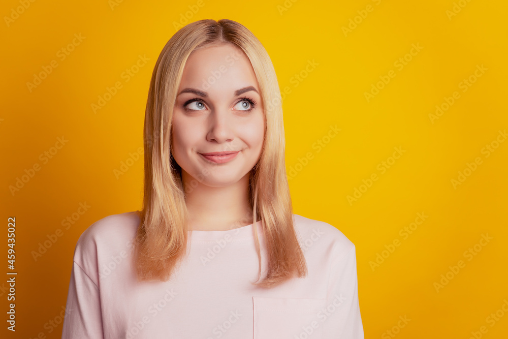 Portrait of hopeful dreamy lady look up empty space imagine ideas on yellow background Portrait of hopeful dreamy lady look up empty space imagine ideas on yellow background