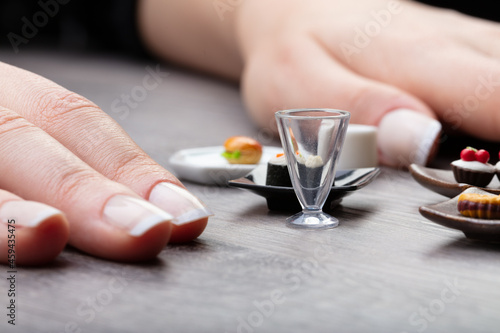 female hands on a table with a mini meal