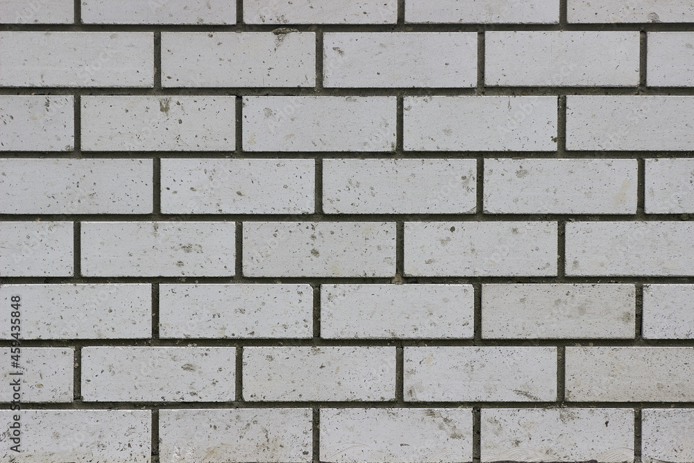 Horizontal texture of the brickwork of buildings, houses or fences