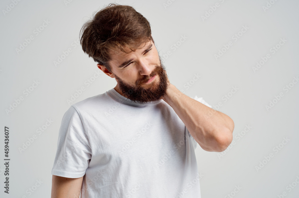 emotional man holding neck arthritis health problems isolated background emotional man holding neck arthritis health problems isolated background