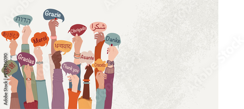 Raised arms and hands of multi-ethnic people from different nations and continents holding speech bubbles with text -thank you- in various different languages. Banner copy space. Equality