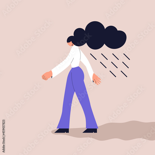 Depressed girl with a cloud and rain over her head. The concept of depression, self-isolation, loneliness, bad mood and mental disorders. Vector illustration in a flat style. Eps 10.