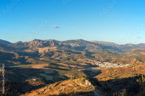 White village at sunset in Andalucian landscape, Spain