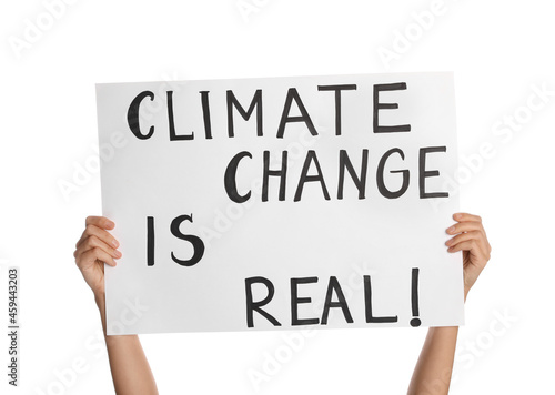 Protestor holding placard with text Climate Change Is Real on white background, closeup