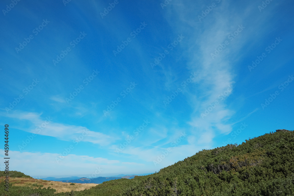 Picturesque view of sky with clouds over mountains