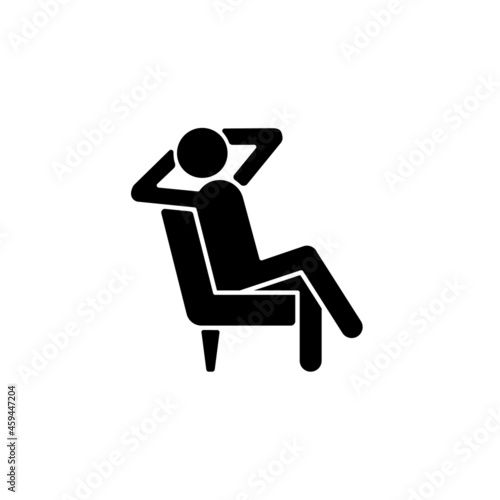 Relax black glyph icon. Man sitting in relaxed pose. Human taking break from work. Person sitting in armchair with legs crossed. Silhouette symbol on white space. Vector isolated illustration