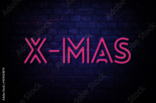 X-Mas Neon inscription of hollyday banner. Neon inscription of X-Mas with glowing backlight. Purple and Blue colors. Isolated graphic element on the dark background.