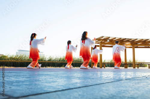 A group performs tai Chi, a Chinese martial art