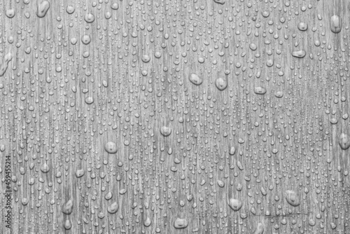 Water drops on metal, grey background. May used as background