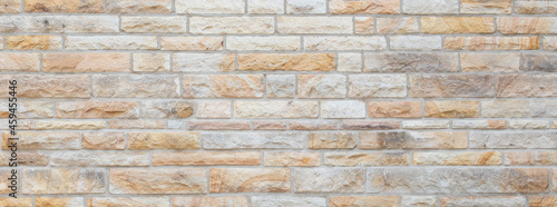 background of old sandstone brick wall texture photo