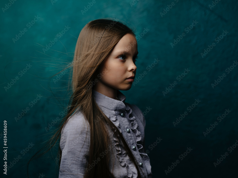 © SHOTPRIME STUDIO - Girl in dress long hair studio green background close-up