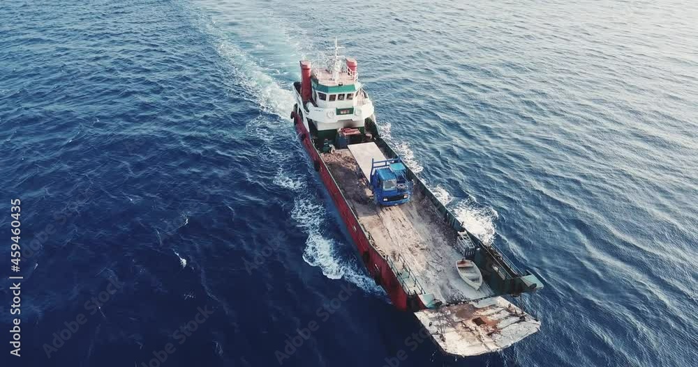 Aerial view of barge transporting single truck. High quality 4k footage Aerial view of barge transporting single truck. High quality 4k footage