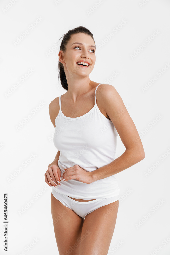 European woman wearing underwear smiling and looking aside European woman wearing underwear smiling and looking aside