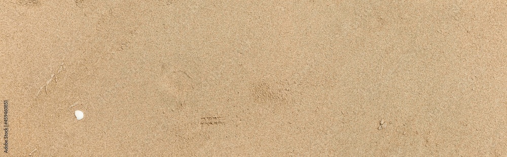 Panorama of Clean brown fine sand for use as a background Panorama of Clean brown fine sand for use as a background