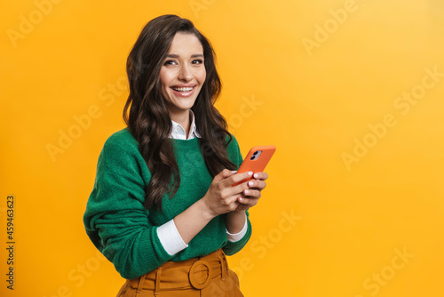 Smiling casual young brunette woman