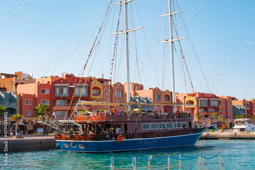 HURGHADA, EGYPT - September 22, 2021 : Marina with tourist boats on Red Sea in sunny day, view from the sea.