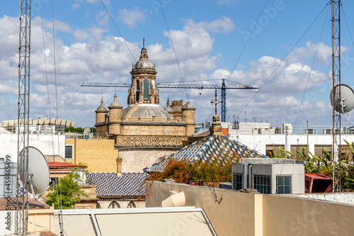 Seville skyline with old church seen from rooftop, Andalusia, Spain photo