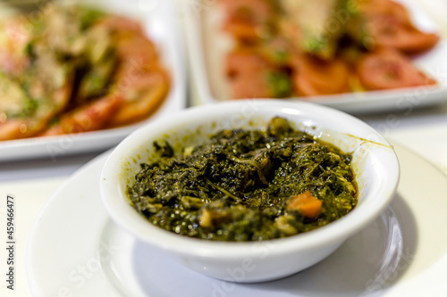 Spinach with carrot and olive oil served as tapas in Seville, Spain