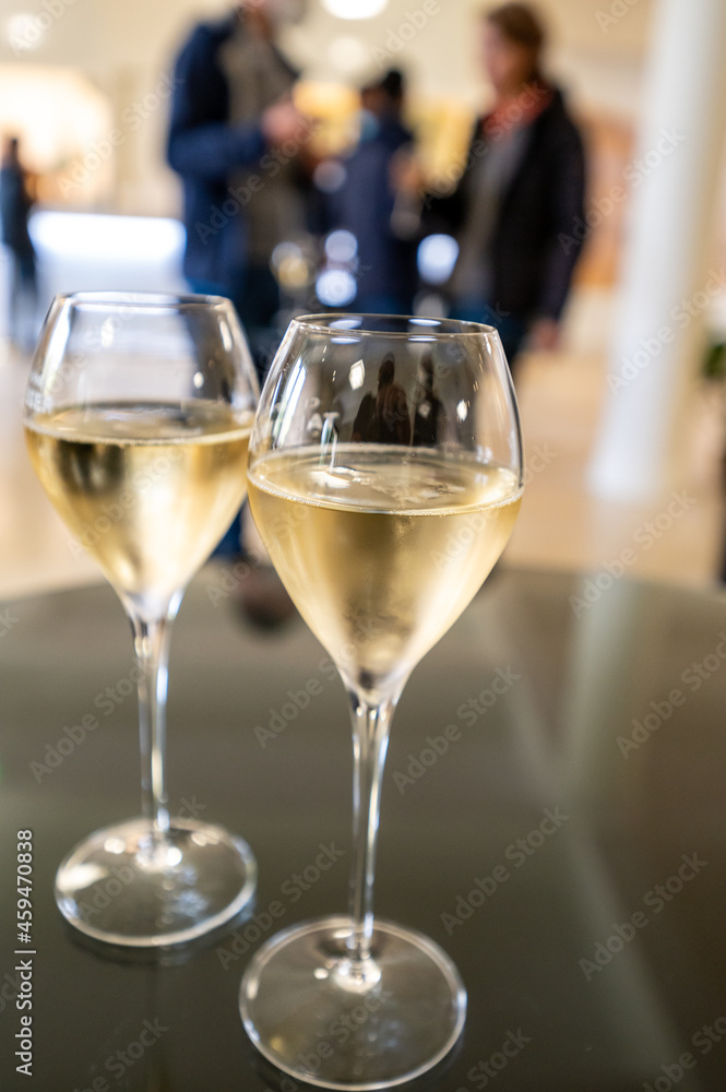 Tasting of brut champagne sparkling wine during visit caves in champagne house in Reims, France Tasting of brut champagne sparkling wine during visit caves in champagne house in Reims, France
