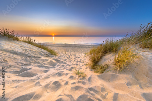 Sunset View over ocean from dune in Zeeland photo