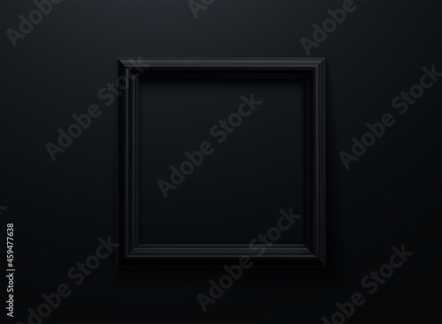 Black picture frame on black wall background