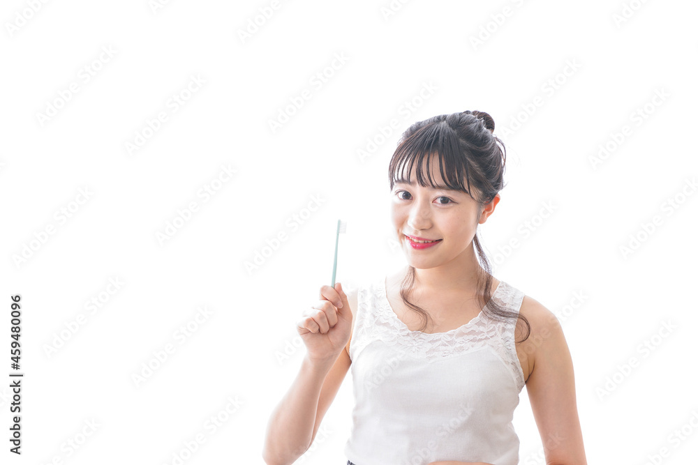 歯磨きをする若い女性 歯磨きをする若い女性