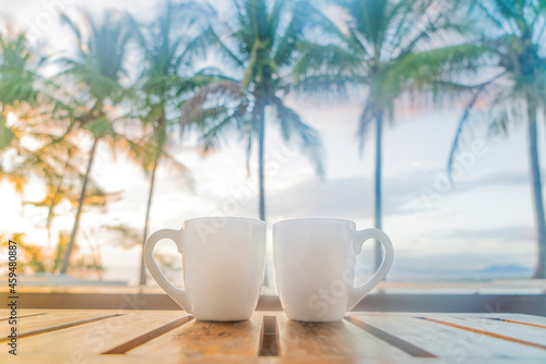 Morning coffee at sunrise on a paradise island vacation