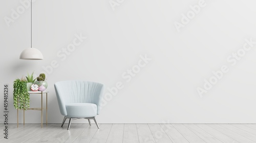 The interior has a armchair on empty white wall background.