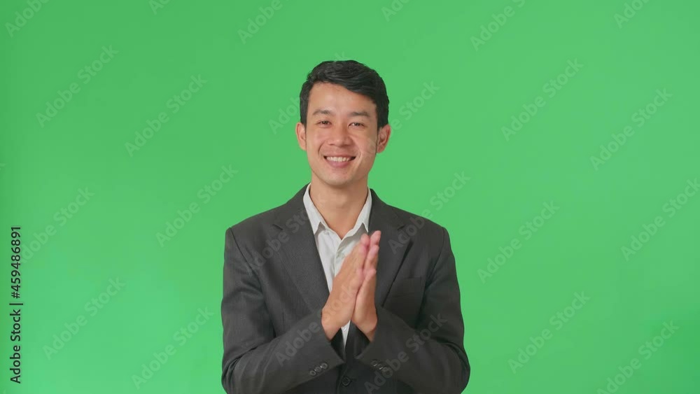 Young Asian Business Man Clapping Her Hands In The Green Screen Studio
Young Asian Business Man Clapping Her Hands In The Green Screen Studio