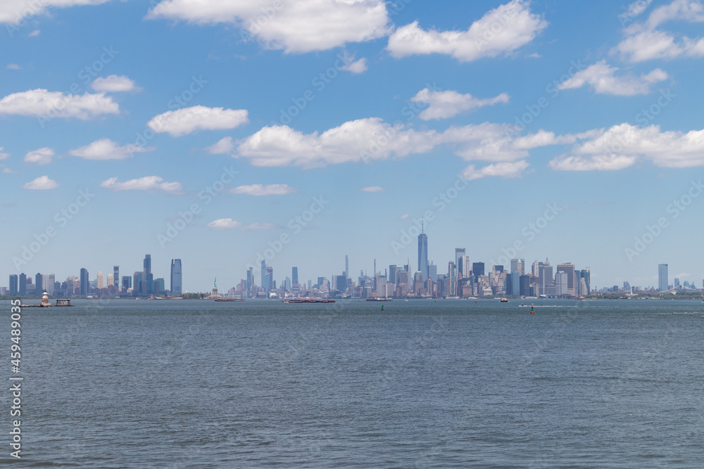 The New York City Skyline in the Distance seen from St. George on Staten Island along New York Harbor