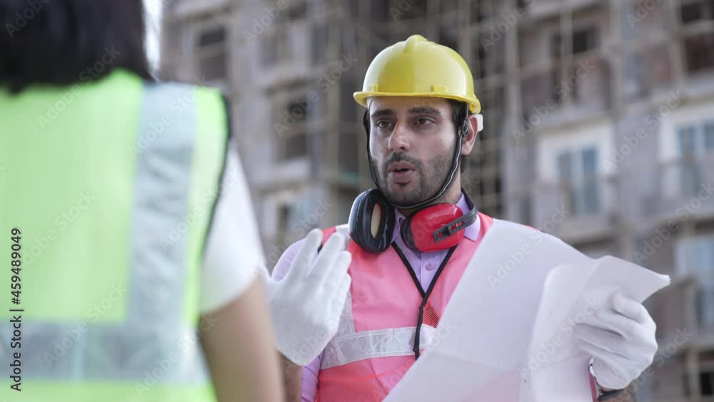 Two Engineer In Helmet Inspecting Building.Developer On Construction Site.Civil Architect Checking Construction.Real Estate Building Project Manager.Builder Contractor Specialist Read Home Plan Scheme Two Engineer In Helmet Inspecting Building.Developer On Construction Site.Civil Architect Checking Construction.Real Estate Building Project Manager.Builder Contractor Specialist Read Home Plan Scheme