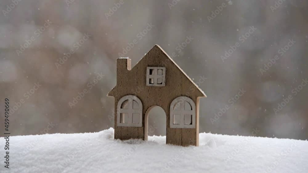 The symbol of the house stands among the snow-covered landscape
The symbol of the house stands among the snow-covered landscape
