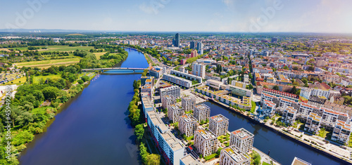 Modern new build properties by the water in Offenbach am Main harbor, Hesse: Development of a new residential area in a city with condominiums and apartments photo