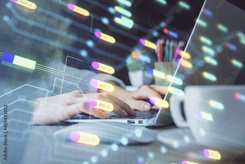 Double exposure of woman hands working on computer and data theme hologram drawing. Tech concept. Double exposure of woman hands working on computer and data theme hologram drawing. Tech concept.