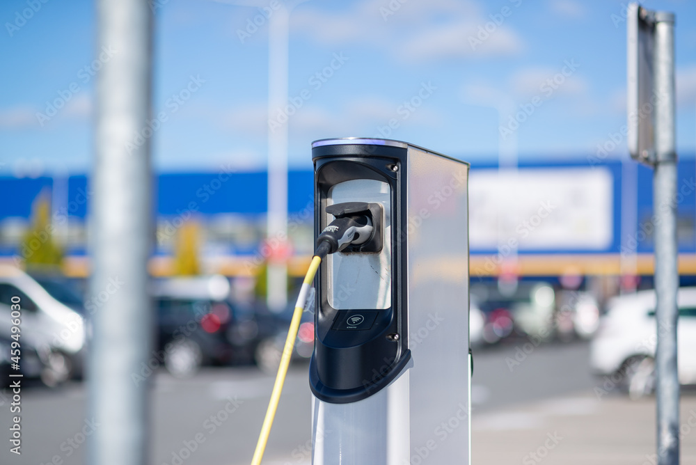 Electric car charging station at a parking lot Electric car charging station at a parking lot