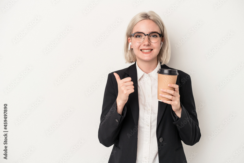 Young caucasian business woman holding take away coffee isolated on white background smiling and raising thumb up Young caucasian business woman holding take away coffee isolated on white background smiling and raising thumb up