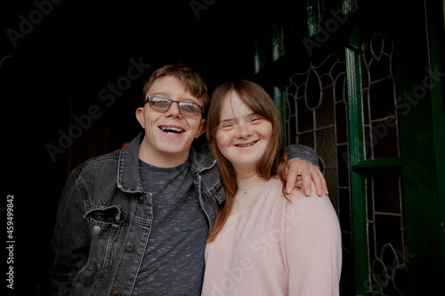 Εκτύπωση καμβά Young couple with Down Syndrome and Foetal Alcohol Syndrome standing at front do