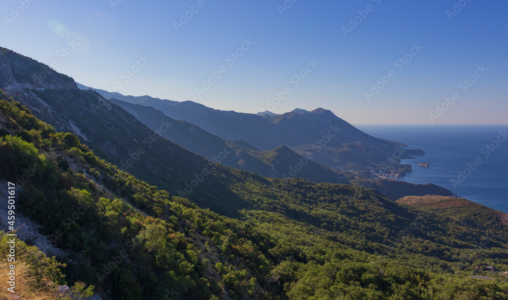 Picturesque panoramic top view of the mountain slopes in the vicinity of Budva and Sveti Stefan, view from the observation deck
