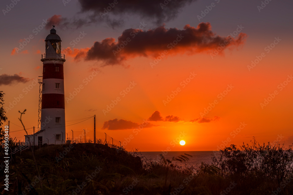 The Lighthouse of Pointe aux Caves (Albion) is situated on the West Coast of Mauritius, and is an emblem for that region