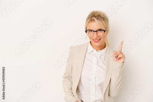 Young business Russian woman isolated on white background showing number one with finger.