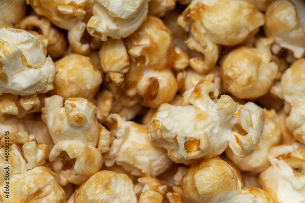 Caramel flavored popcorns. An image with a shallow depth of field. Caramel flavored popcorns. An image with a shallow depth of field.